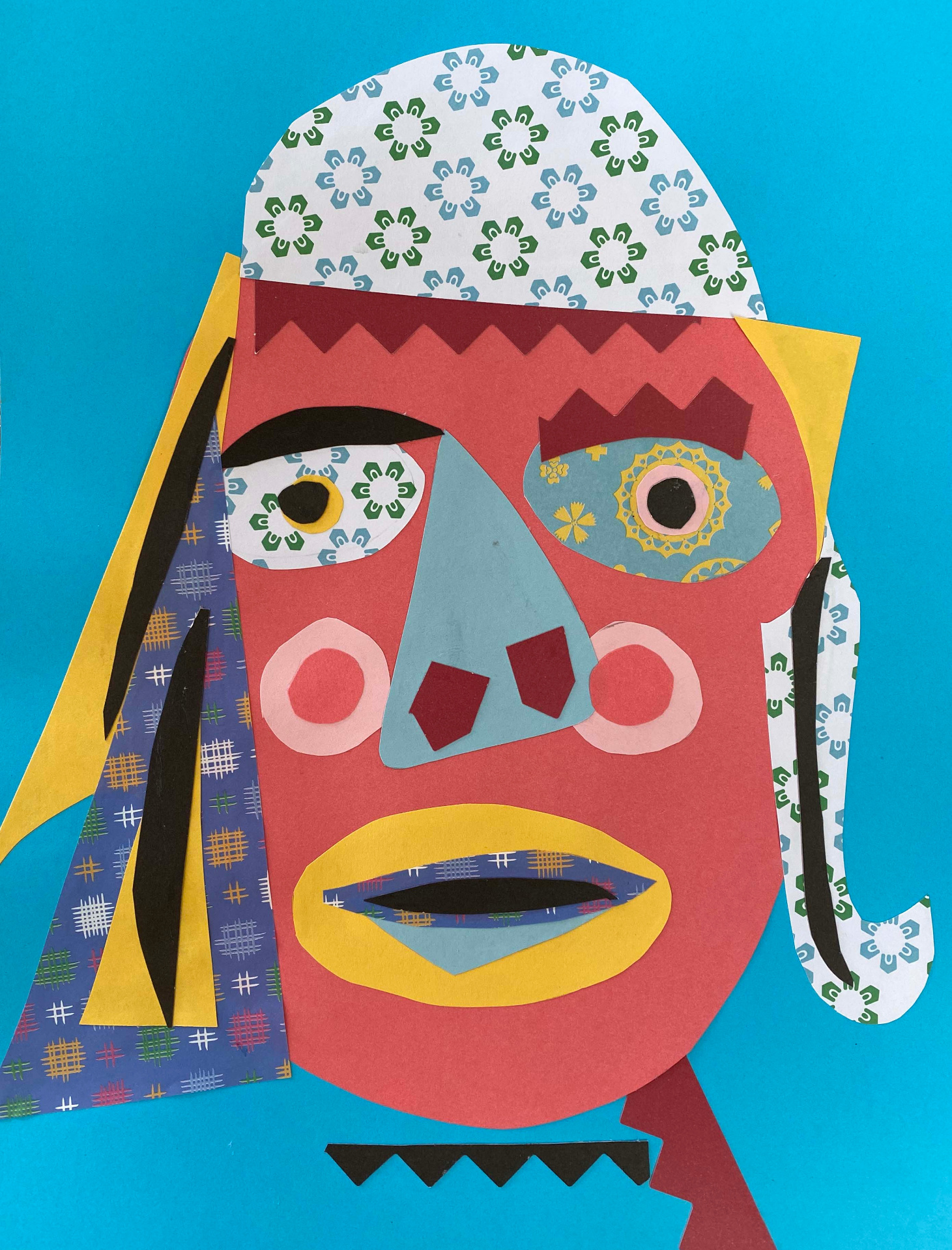 Face made of cutout patterns